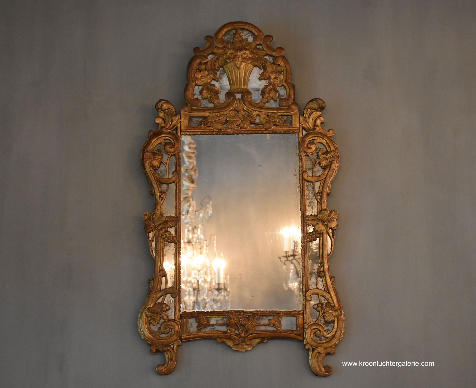 Louis XV carved and gilt wood provincial mirror