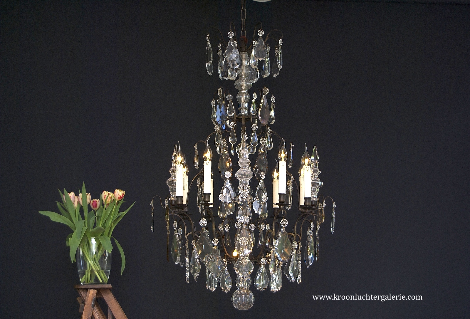 A wonderful early 20th c. French chandelier with dark patina
