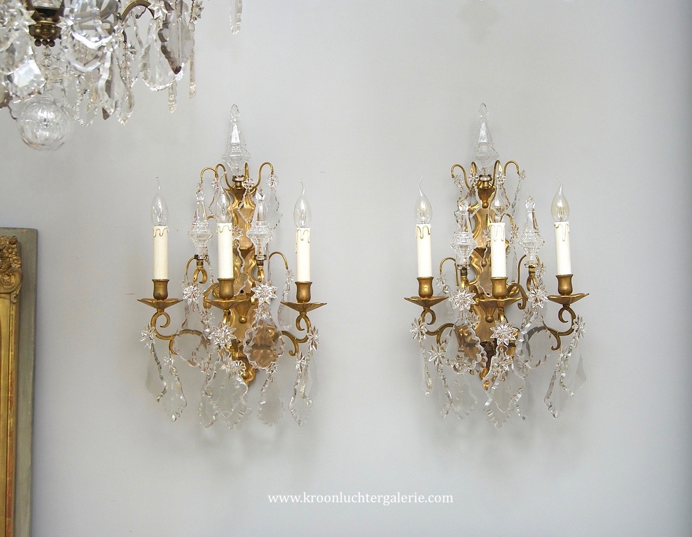 A pair of 18th century French crystal wall lights