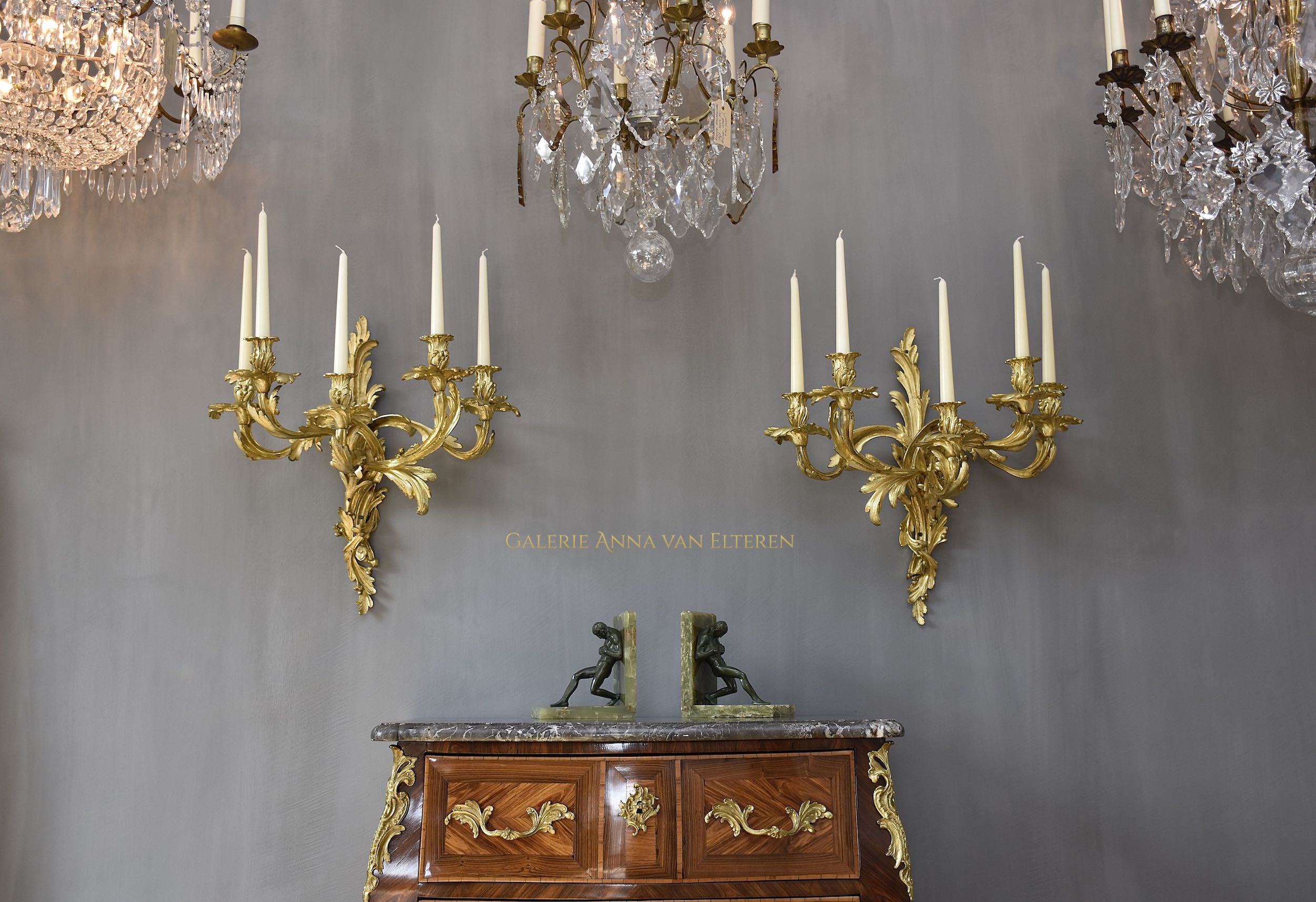 A pair of large gilt bronze wall appliques in the style of Louis XV