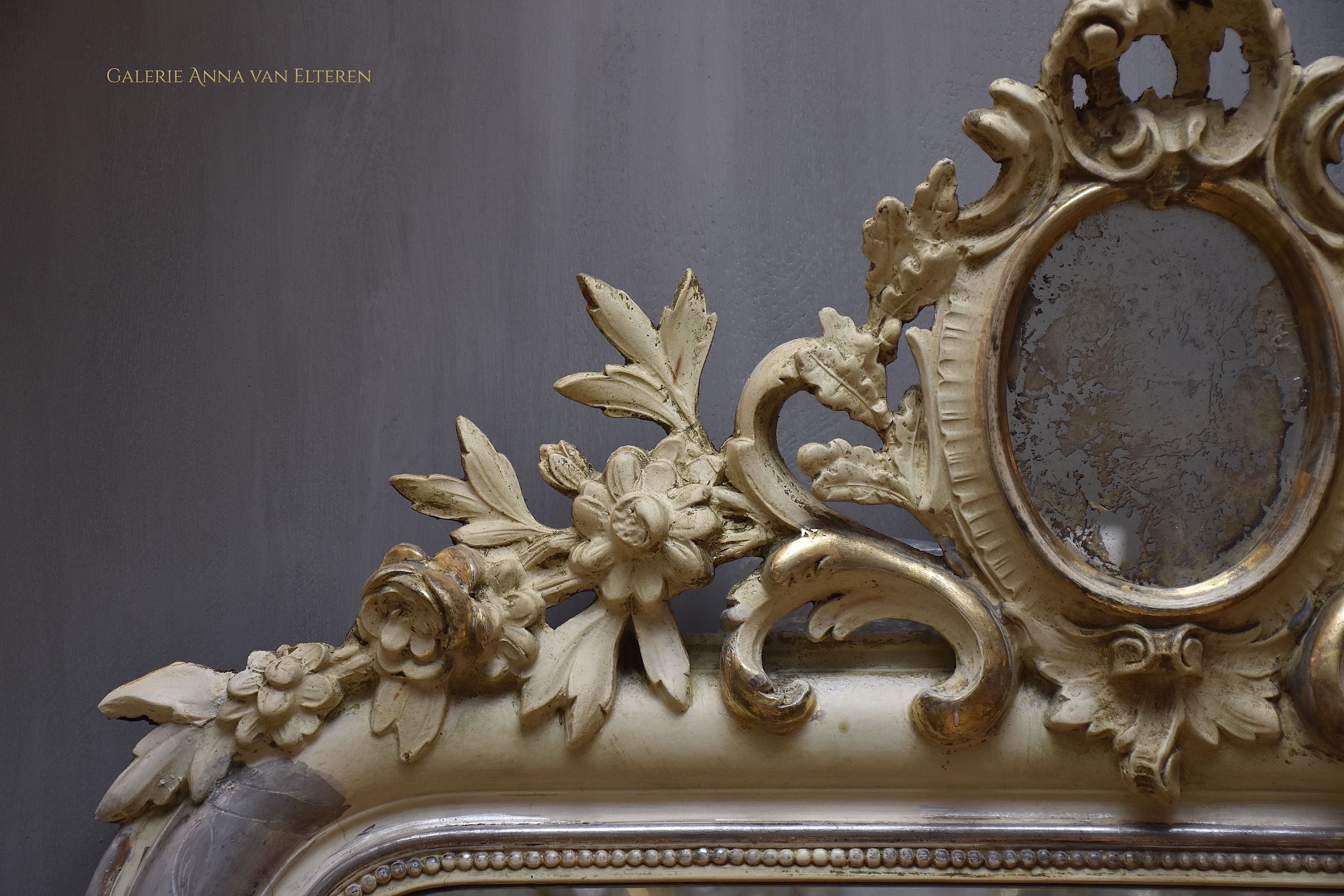19th c. silver leaf gilded French mirror with a crown