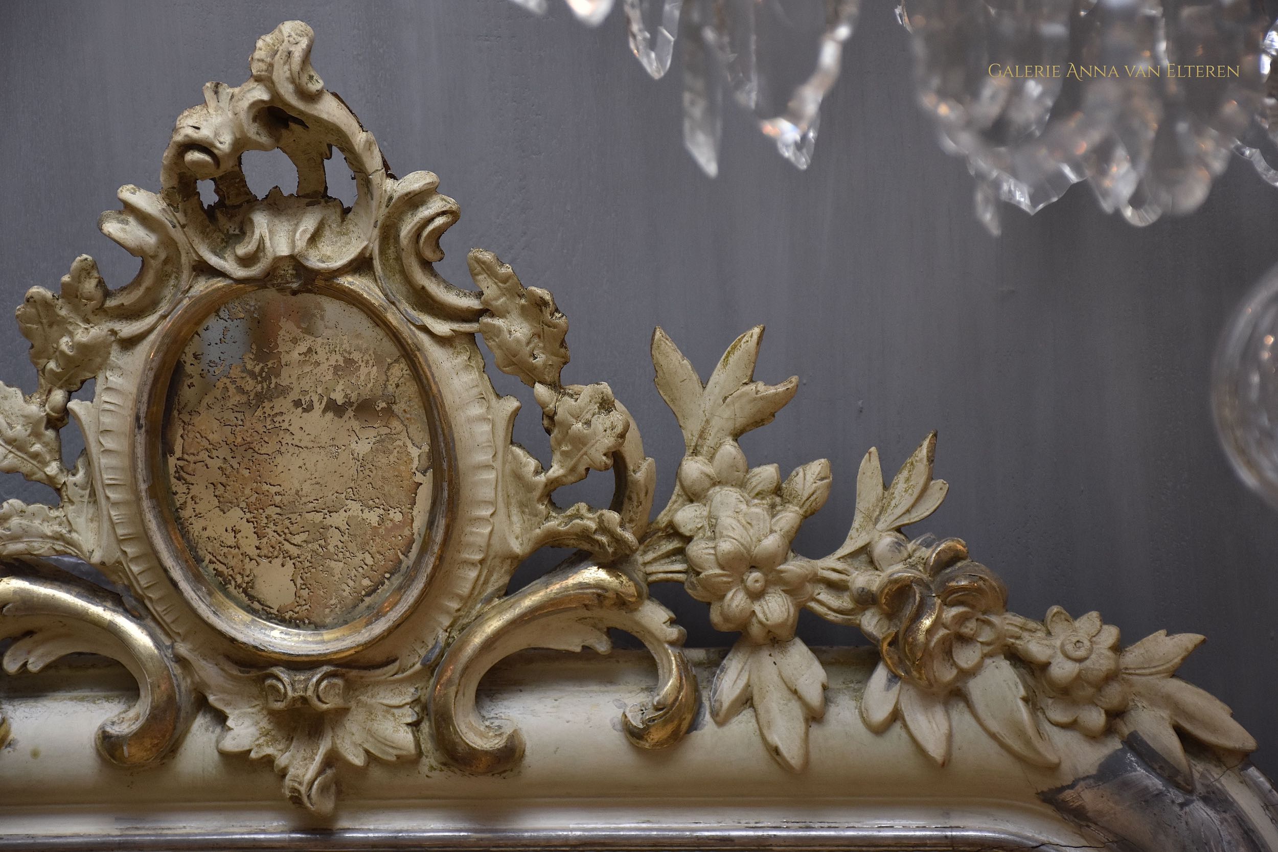 19th c. silver leaf gilded French mirror with a crown