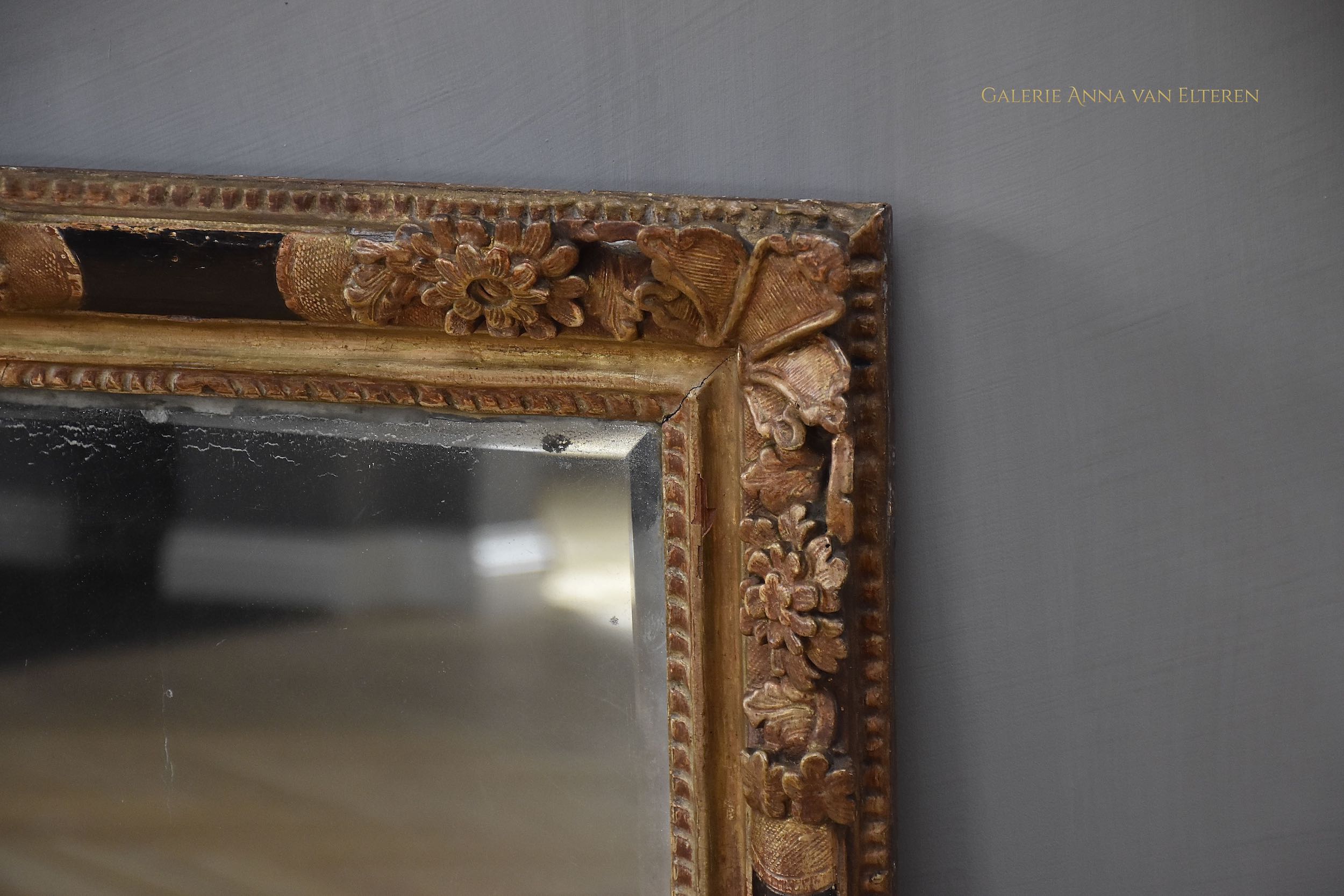 Antique  French gilded and lacquered mirror