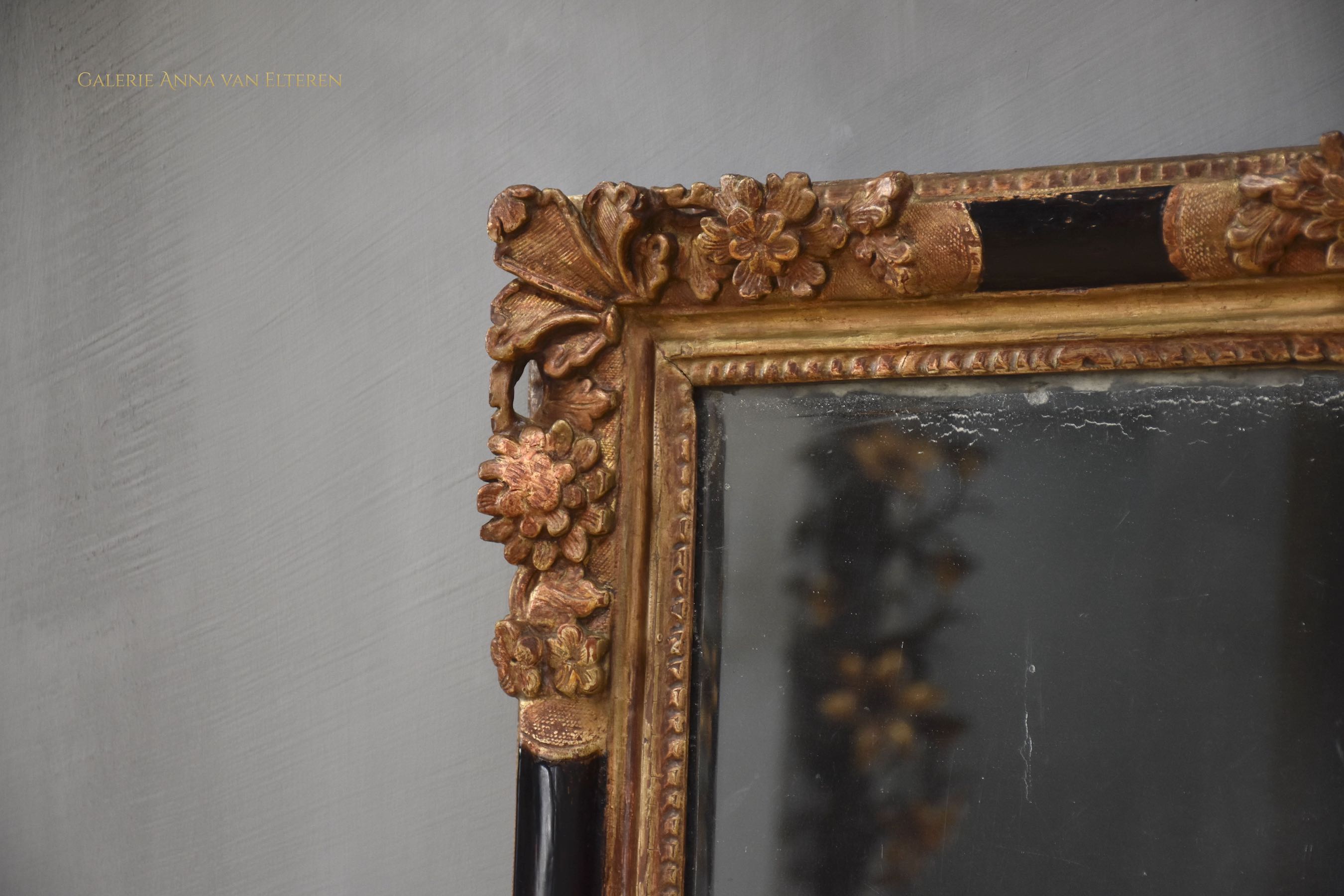 Antique  French gilded and lacquered mirror