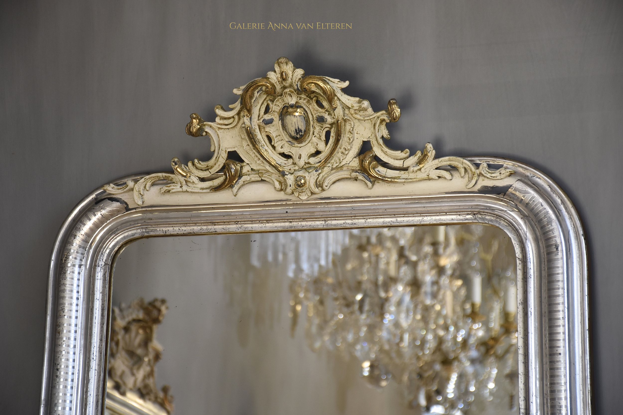 Large antique French mirror Louis-Philippe with a crest