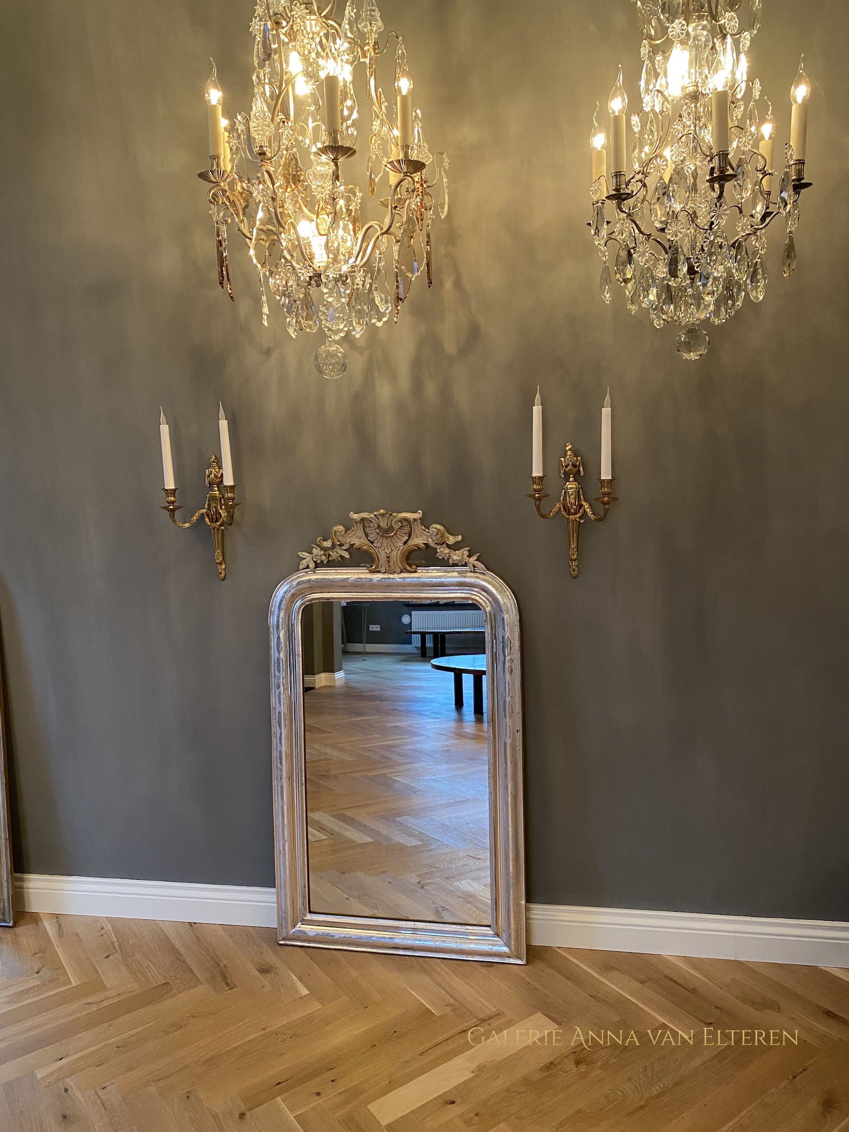 19th c. antique French mirror with a crest