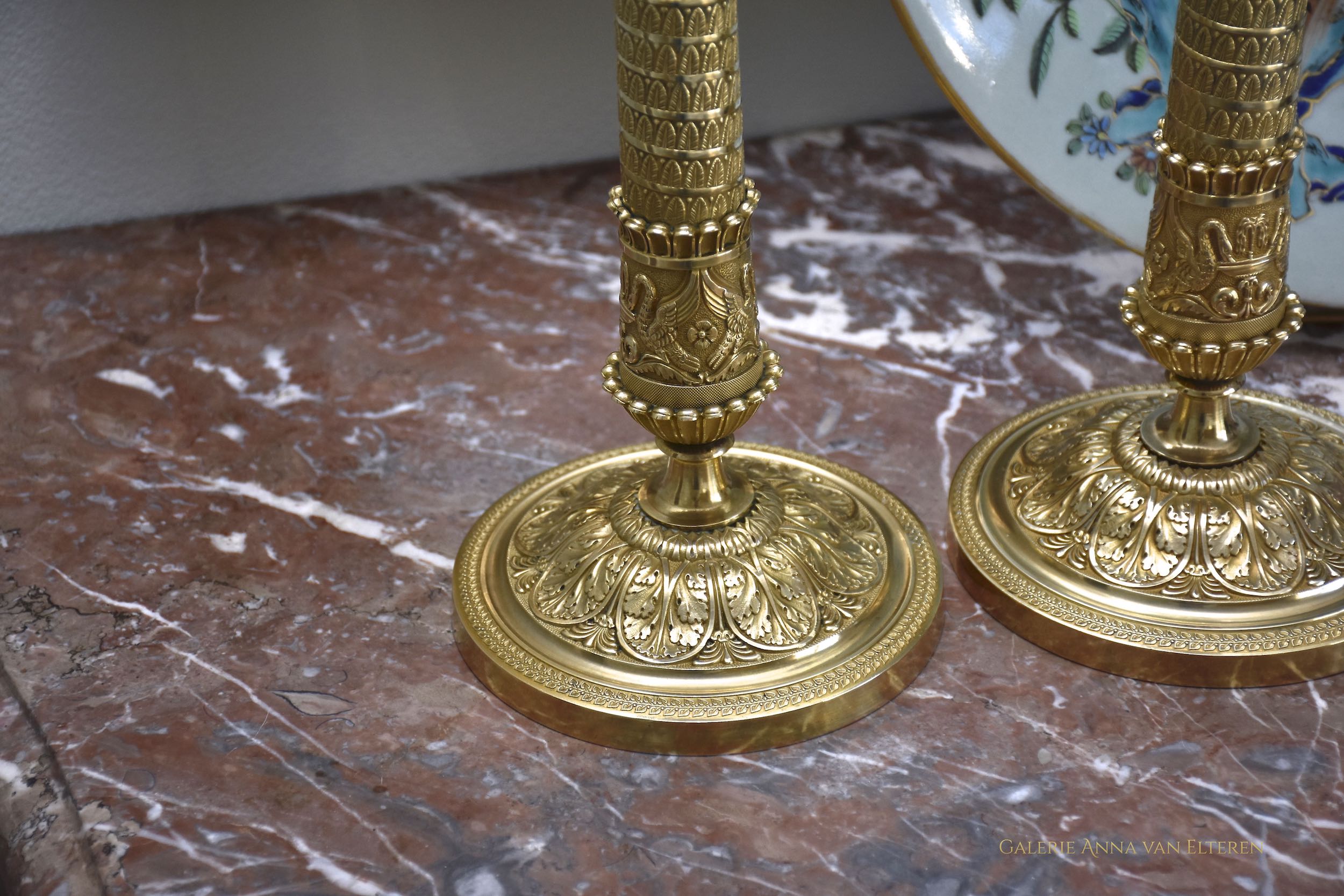 A fine pair of 19th c. gilt and chased bronze candlesticks