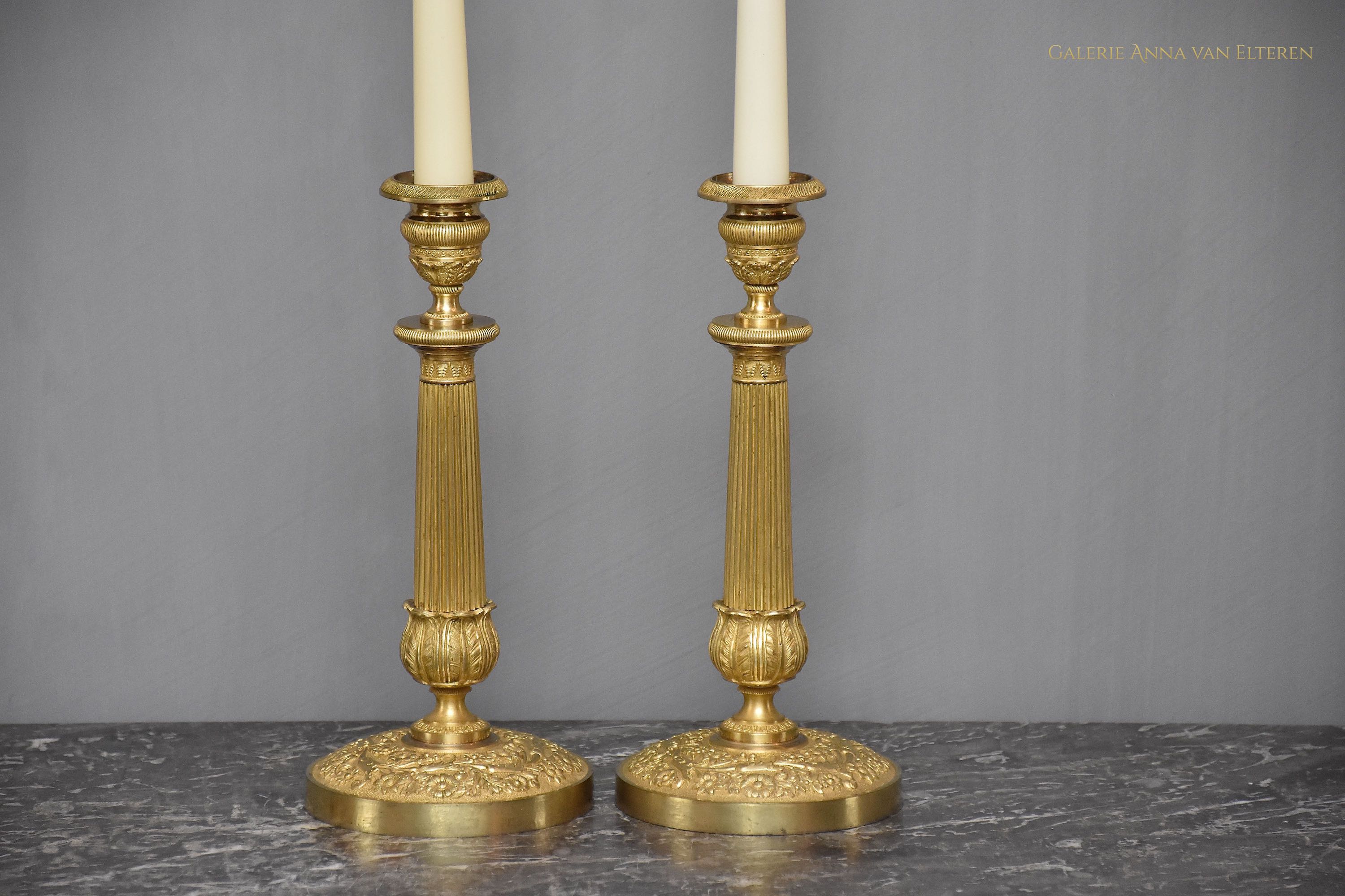 A pair of 19th c. gilt bronze Empire candlesticks