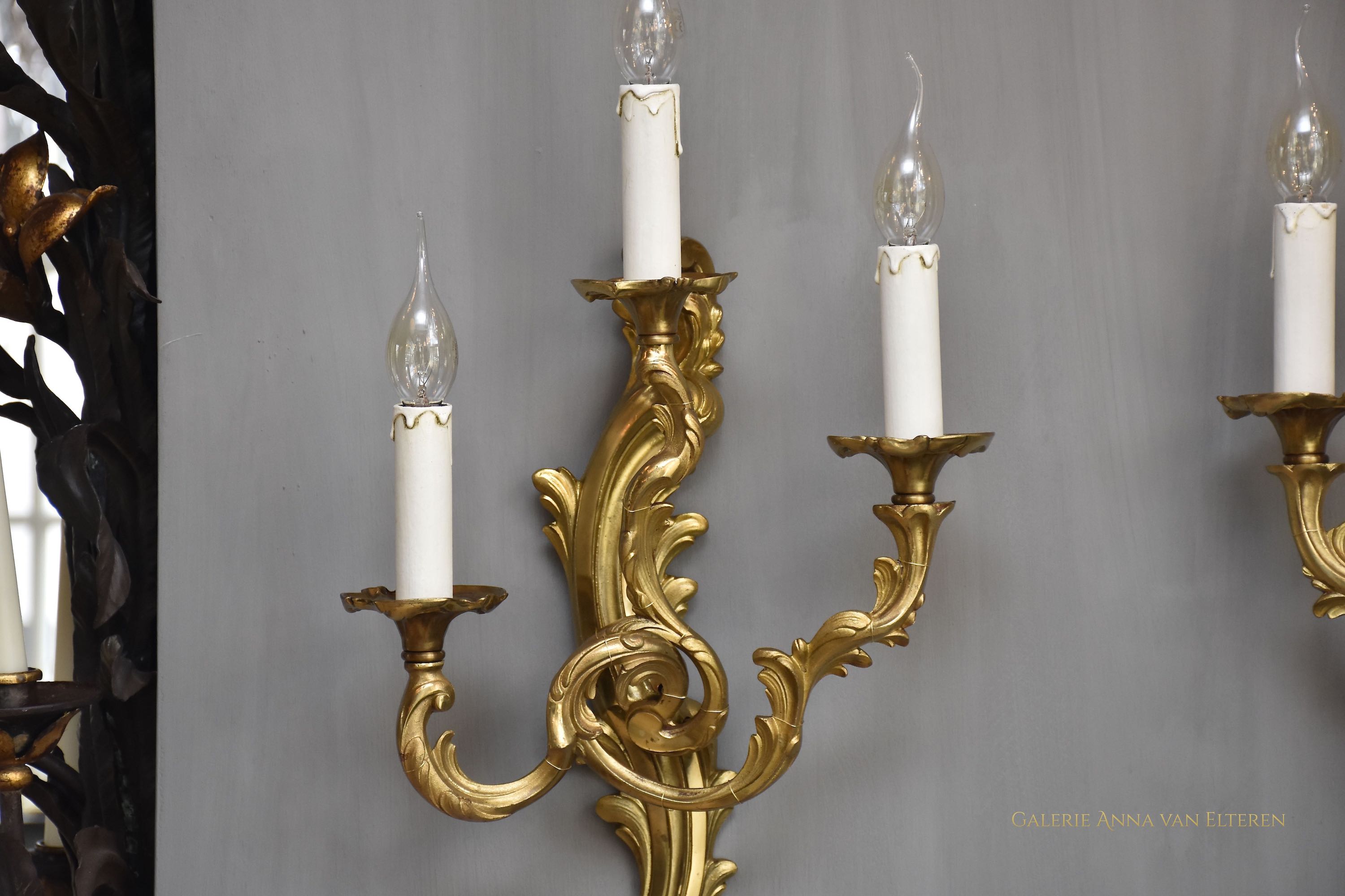 A pair of gilt bronze French wall lights