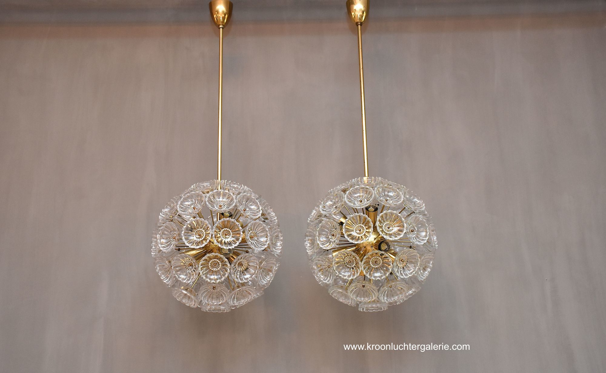 A pair of Sputnik floral chandeliers in the style of E. Stejnar