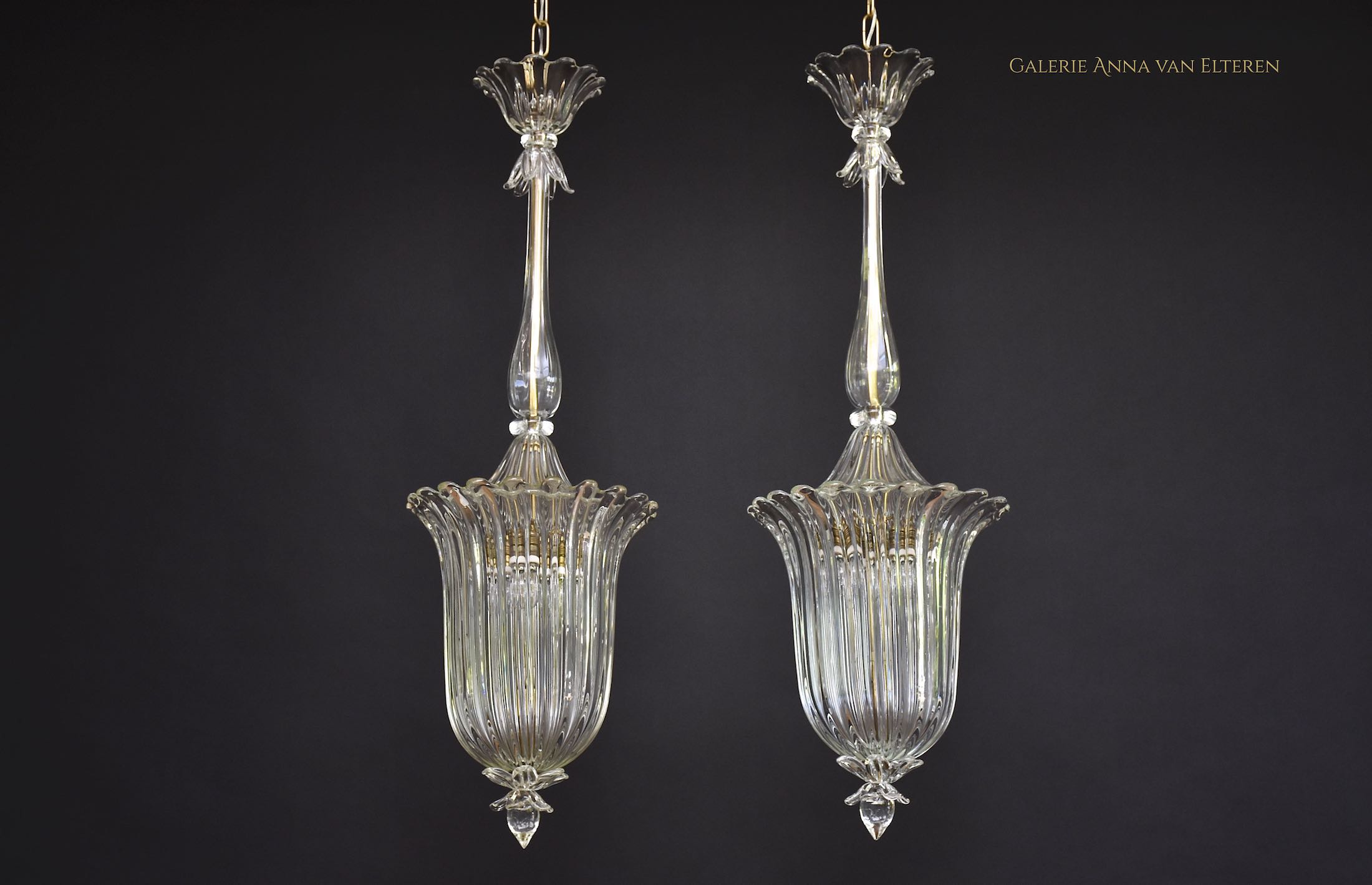 A pair of Seguso Murano glass and brass lantern/ pendants
